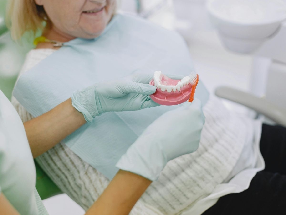 How Do Partial Dentures Stay Secure in Your Mouth?